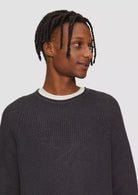 9897