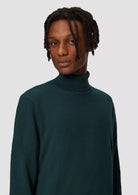 7699